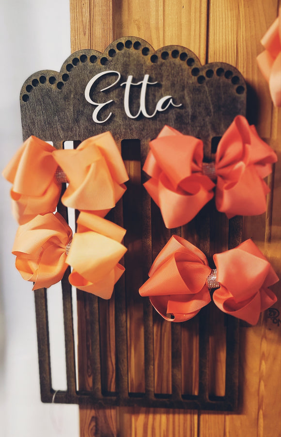 Scalloped bow holder
